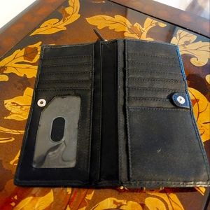 Fossil Wallet used, black with lots of space,